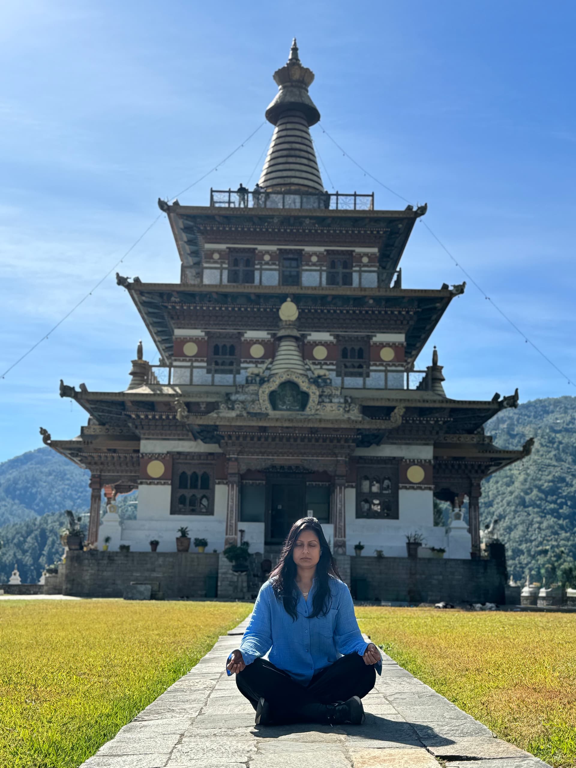 Meditating in front of a Bhutanese temple